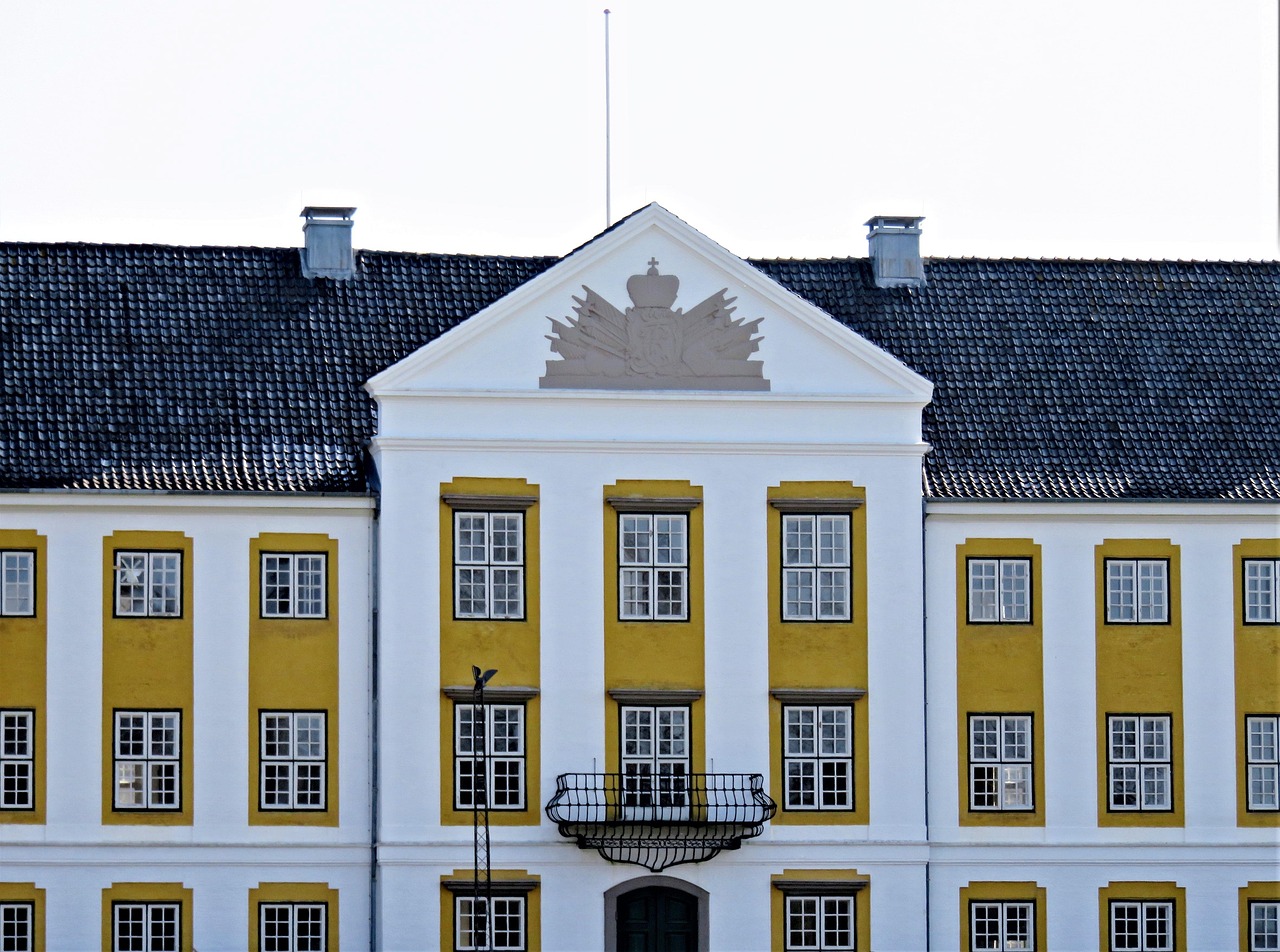 the castle of augustenborg, denmark, built in the 18th century, century, newly restored, beautiful facade, royal coat of arms in the gable, architecture, building, historical, worth seeing