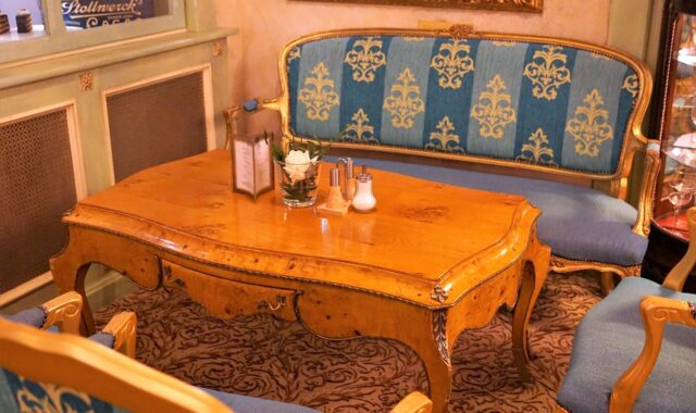 furniture, chair, table, room, luxury, inside, house, armchair, seat, carpet, wood, hotel, interior, ornament, lamp, pillow, coffee shop, restaurant, living room, furnishing, innenasustatung, art nouveau, style, blue, material, template, enjoyment, quiet, vacations, recreation, old, antique, rest, fixed, party, to sit, seating arrangement, shine