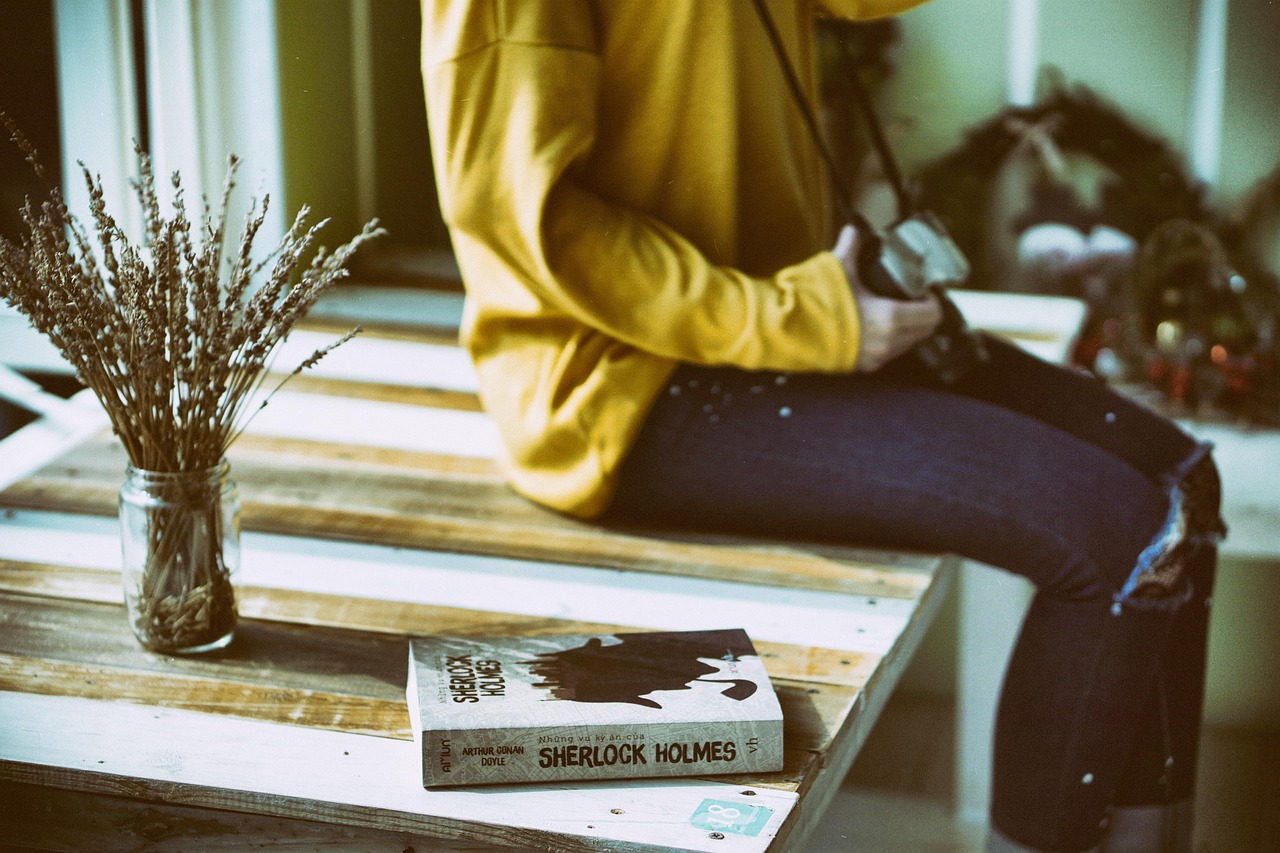 book, furniture, girl, sitting, table, woman, wood, book, book, book, book, book, furniture, table, woman, woman