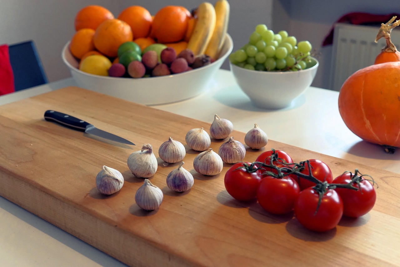 board, kitchen, wooden board, cutting board, tomatoes, garlic